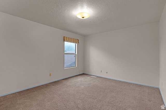 597 W Brookshire Dr, Ogden, UT 84405 - empty room with a textured ceiling and light carpet