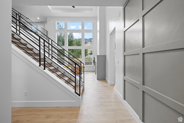 168 N 870 E Unit 22, Tremonton, UT 84337 - stairway with wood finished floors and a raised ceiling