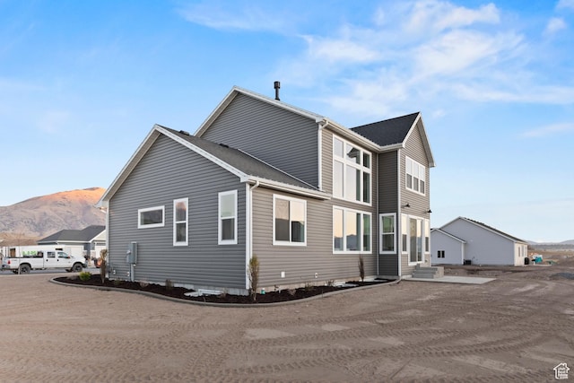 168 N 870 E Unit 22, Tremonton, UT 84337 - view of side of property featuring entry steps and a mountain view