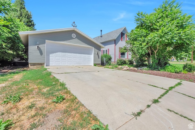 648 E 2550 N, North Ogden, UT 84414 - view of side of home featuring a garage