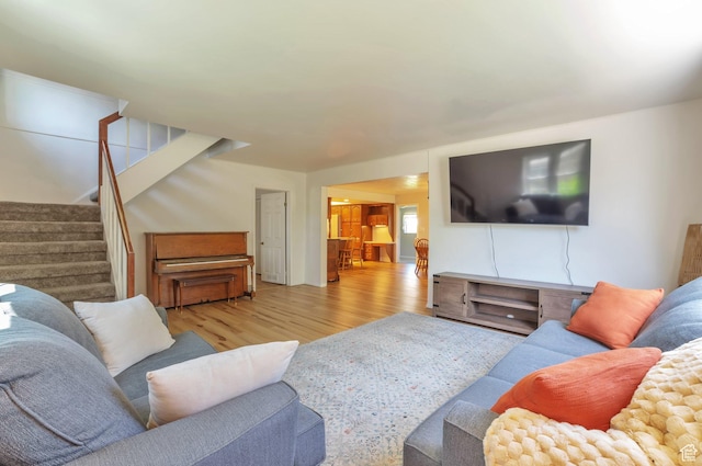 648 E 2550 N, North Ogden, UT 84414 - living room featuring wood finished floors and stairs
