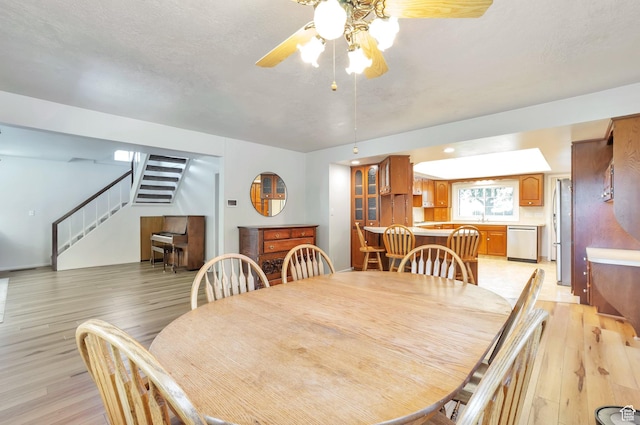 648 E 2550 N, North Ogden, UT 84414 - dining area with stairway, light wood-style floors, and ceiling fan