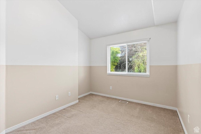 1014 W 4150 S, Riverdale, UT 84405 - carpeted spare room featuring vaulted ceiling and baseboards