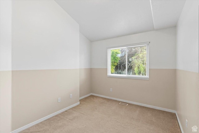 1014 W 4150 S, Riverdale, UT 84405 - carpeted spare room with lofted ceiling and baseboards