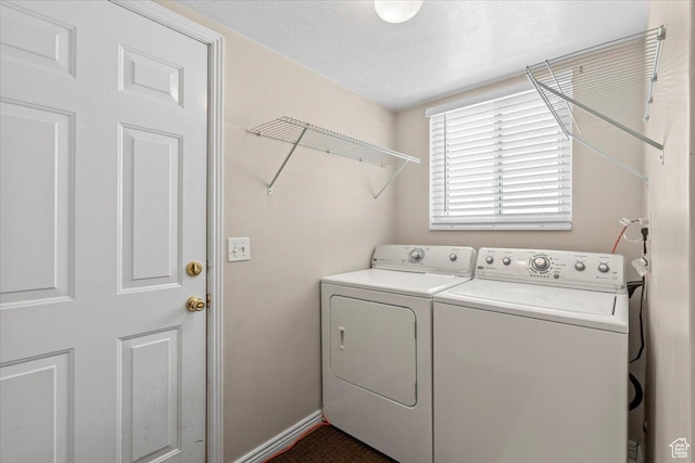1014 W 4150 S, Riverdale, UT 84405 - washroom featuring washer and clothes dryer and baseboards