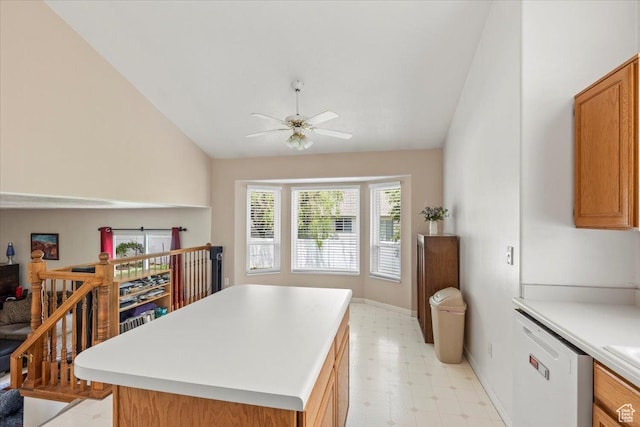 1014 W 4150 S, Riverdale, UT 84405 - kitchen with dishwasher, vaulted ceiling, a ceiling fan, light countertops, and light flooring
