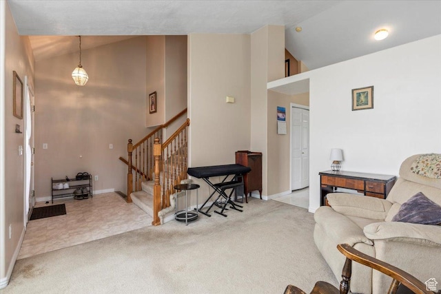 1014 W 4150 S, Riverdale, UT 84405 - living room featuring carpet, stairway, and high vaulted ceiling