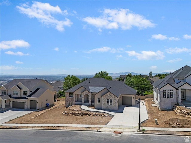 4095 N 100 E, North Ogden, UT 84414 - french provincial home with driveway, a residential view, a garage, and stone siding