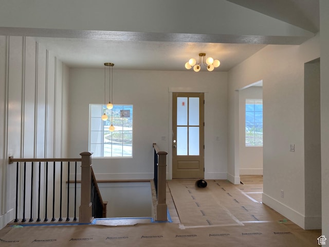 4095 N 100 E, North Ogden, UT 84414 - entrance foyer featuring plenty of natural light and a chandelier