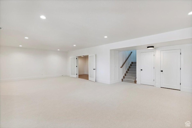 4095 N 100 E, North Ogden, UT 84414 - finished below grade area with stairway, light colored carpet, and recessed lighting