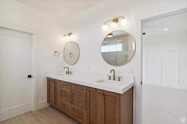 4095 N 100 E, North Ogden, UT 84414 - bathroom with double vanity and wood finished floors