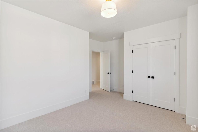 4095 N 100 E, North Ogden, UT 84414 - unfurnished bedroom featuring light colored carpet and a closet
