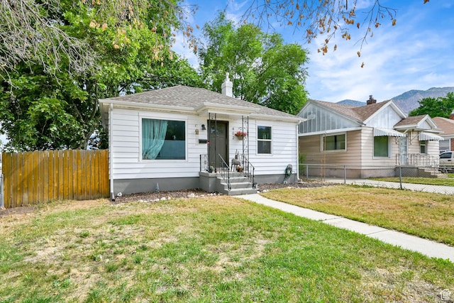 402 E 5th St S, Ogden, UT 84404 - bungalow featuring a chimney