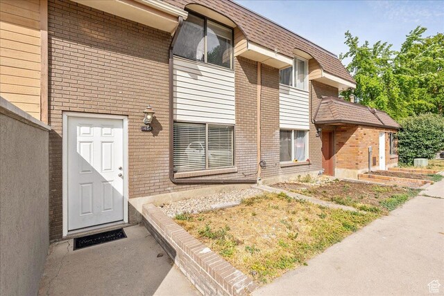 1454 Lancelot Dr, Provo, UT 84601 - entrance to property with brick siding