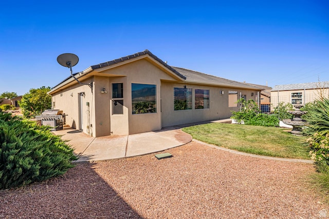 93 E 700 N, La Verkin, UT 84745 - back of house with stucco siding and a patio area
