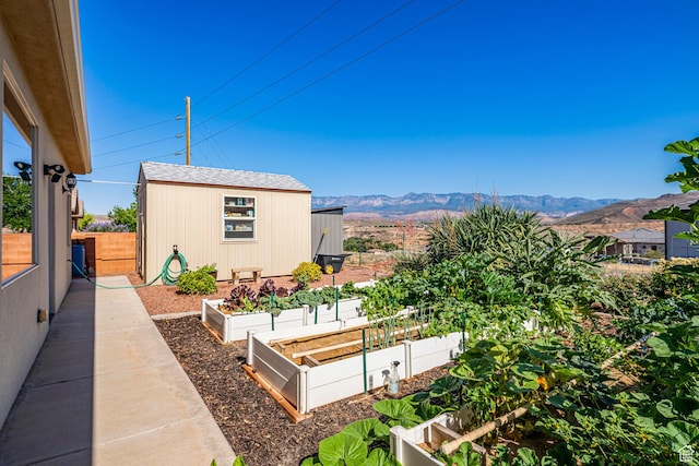 93 E 700 N, La Verkin, UT 84745 - view of yard with a vegetable garden, a mountain view, and an outdoor structure