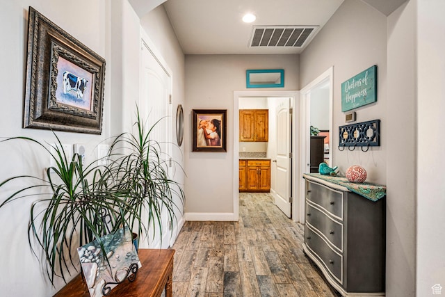 93 E 700 N, La Verkin, UT 84745 - corridor with wood finished floors, arched walkways, and recessed lighting