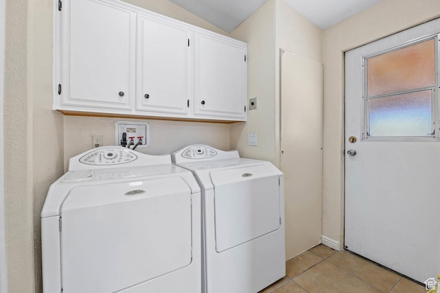 1309 Pine Canyon Rd, Tooele, UT 84074 - washroom featuring cabinet space, washer and clothes dryer, and light tile patterned flooring