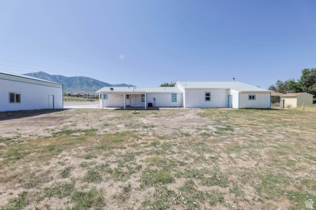 1309 Pine Canyon Rd, Tooele, UT 84074 - back of property with a mountain view