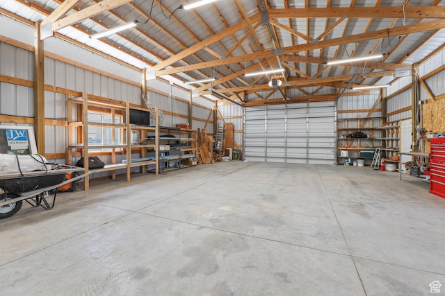1309 Pine Canyon Rd, Tooele, UT 84074 - garage with a garage door opener and metal wall