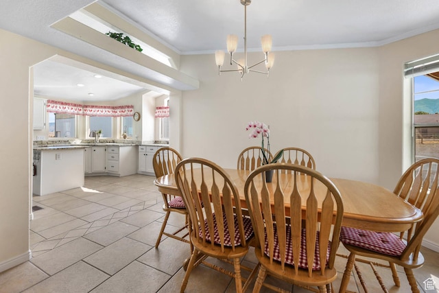 1309 Pine Canyon Rd, Tooele, UT 84074 - dining space with a chandelier, crown molding, and light tile patterned floors