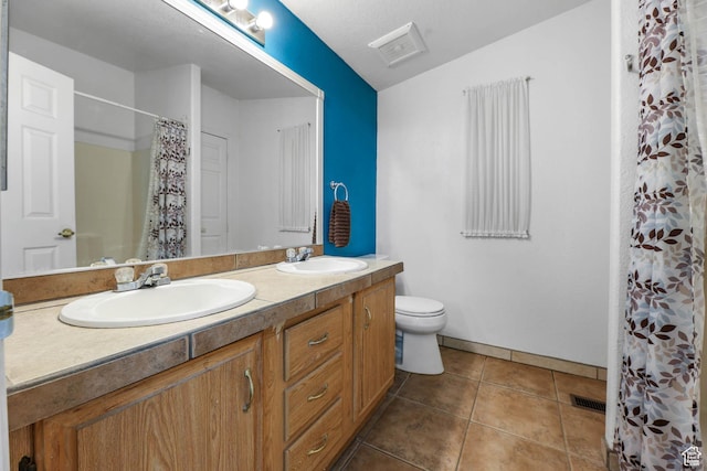 1309 Pine Canyon Rd, Tooele, UT 84074 - bathroom with double vanity, tile patterned flooring, curtained shower, and vaulted ceiling