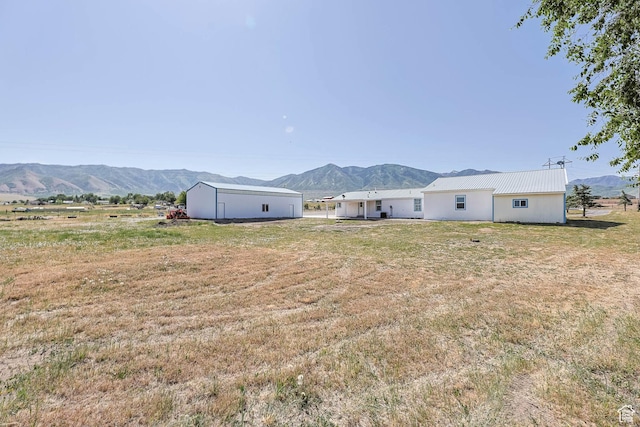 1309 Pine Canyon Rd, Tooele, UT 84074 - view of grassy yard with a mountain view