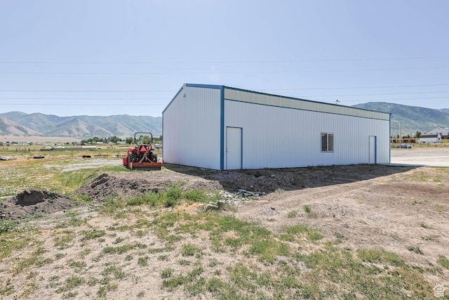 1309 Pine Canyon Rd, Tooele, UT 84074 - view of pole building featuring a mountain view