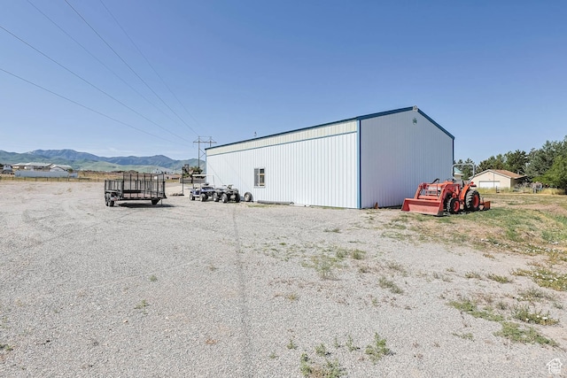 1309 Pine Canyon Rd, Tooele, UT 84074 - view of pole building with a mountain view
