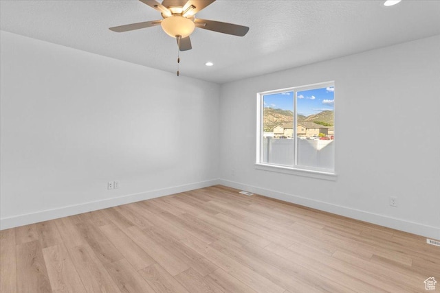 221 W 815 N Unit 21, Nephi, UT 84648 - unfurnished room with light wood-style floors, a ceiling fan, and recessed lighting