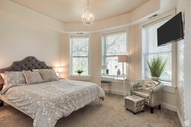 22 W 300 N, Salt Lake City, UT 84103 - carpeted bedroom with multiple windows and a chandelier