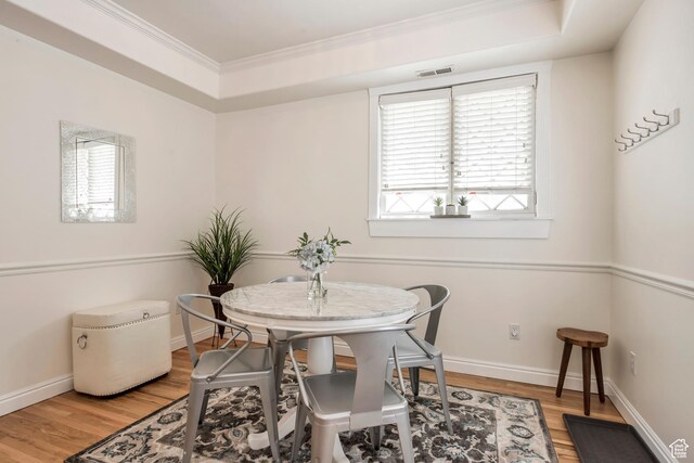 22 W 300 N, Salt Lake City, UT 84103 - dining area featuring light wood-style floors and ornamental molding
