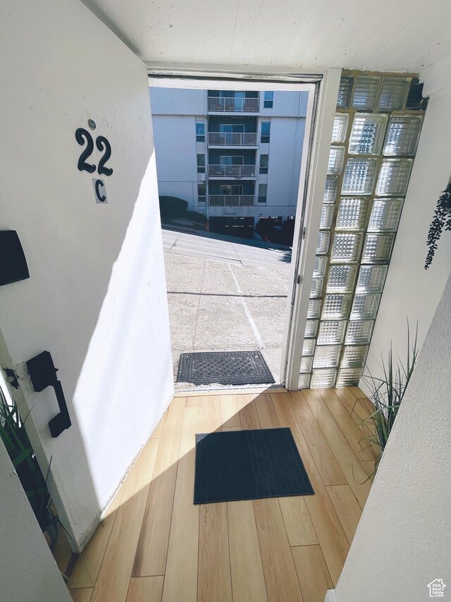 22 W 300 N, Salt Lake City, UT 84103 - doorway to outside featuring wood finished floors