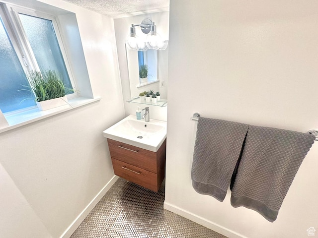 22 W 300 N, Salt Lake City, UT 84103 - bathroom featuring vanity and tile patterned floors