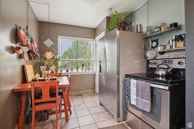 1026 W 800 N, Salt Lake City, UT 84116 - kitchen featuring stainless steel range with electric cooktop and light tile patterned floors