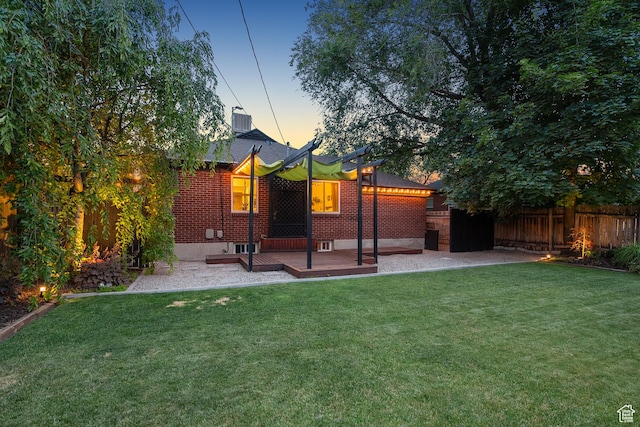 1026 W 800 N, Salt Lake City, UT 84116 - rear view of property with a patio, a wooden deck, and brick siding