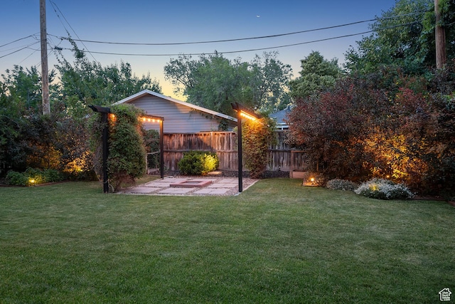 1026 W 800 N, Salt Lake City, UT 84116 - yard at dusk with a patio