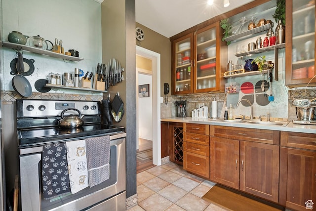 1026 W 800 N, Salt Lake City, UT 84116 - kitchen featuring stainless steel range with electric stovetop, backsplash, open shelves, and light tile patterned flooring