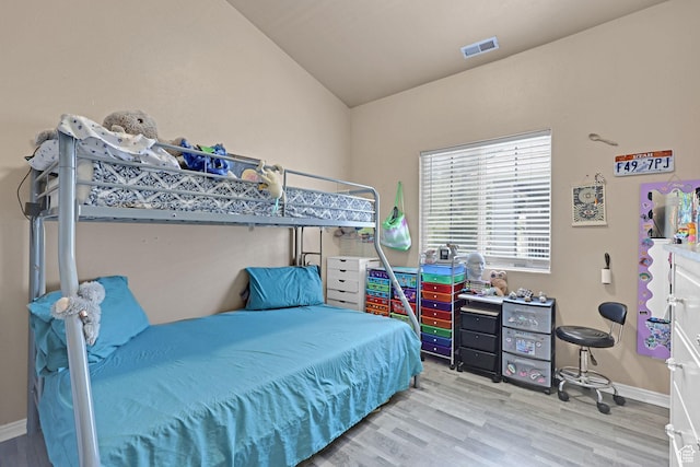 3827 S Big River Way W Unit 3, South Salt Lake, UT 84119 - bedroom with vaulted ceiling and wood finished floors
