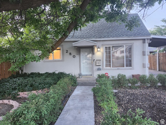 280 E Franklin St S, Ogden, UT 84401 - view of front of house with stucco siding and roof with shingles