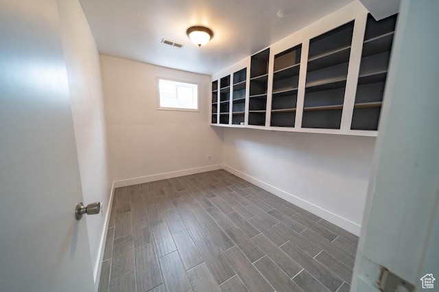 195 N 800 W, Cleveland, UT 84518 - unfurnished room with baseboards and dark wood-style flooring