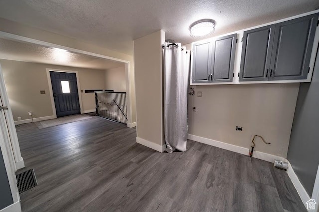 195 N 800 W, Cleveland, UT 84518 - laundry area featuring a textured ceiling and dark wood finished floors