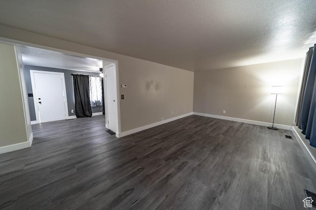 195 N 800 W, Cleveland, UT 84518 - empty room with dark wood finished floors and baseboards