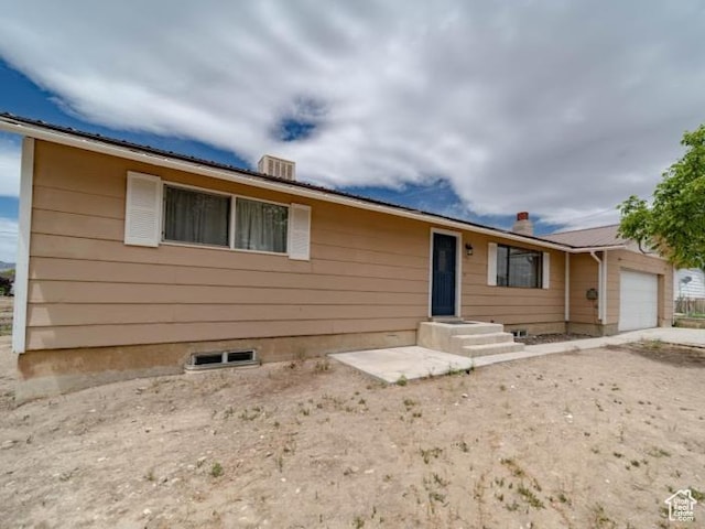 195 N 800 W, Cleveland, UT 84518 - ranch-style house with an attached garage and a metal roof