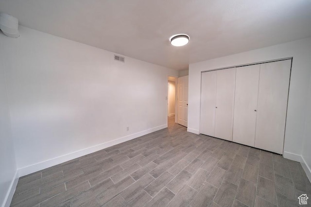 195 N 800 W, Cleveland, UT 84518 - unfurnished bedroom featuring wood finished floors and a closet
