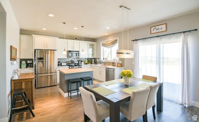 3319 N Falcon Way, Layton, UT 84040 - dining room with recessed lighting and light wood-type flooring