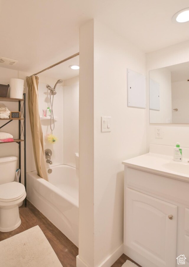 3319 N Falcon Way, Layton, UT 84040 - bathroom featuring wood finished floors, vanity, shower / bath combo, and recessed lighting