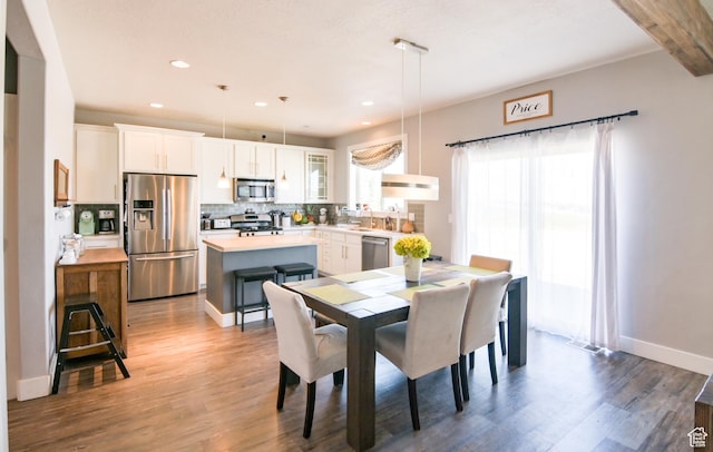 3319 N Falcon Way, Layton, UT 84040 - dining room with wood finished floors and recessed lighting