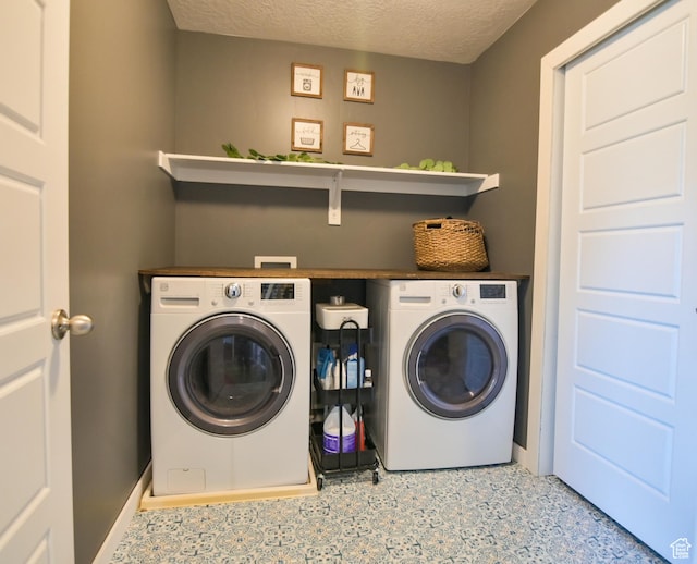 3319 N Falcon Way, Layton, UT 84040 - laundry area featuring washing machine and dryer and a textured ceiling
