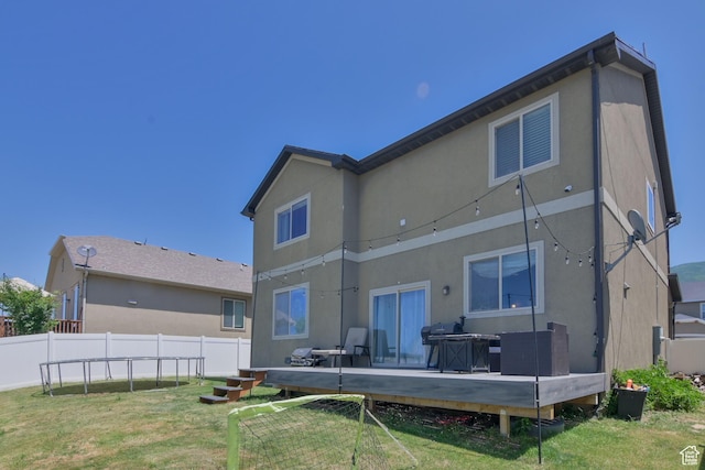 3319 N Falcon Way, Layton, UT 84040 - rear view of house with a wooden deck and stucco siding